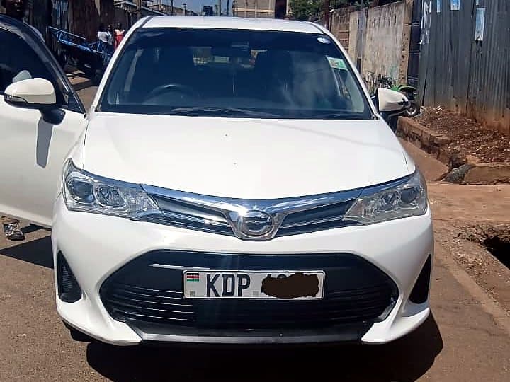 Frasha's white Toyota Axio
